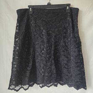 Daisy Fuentes Lacy Black Skirt Size 12. Waist 36", Length 22". Under Lining.